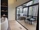 Relaxing outdoor patio with dining and lounge areas accessible from the living space at 904 Kings Ne Ct, Atlanta, GA 30306