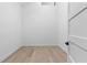 Neutral room with hardwood flooring and minimalist design, illuminated by natural light at 904 Kings Ne Ct, Atlanta, GA 30306