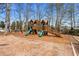 Well-maintained playground with slides and swings, providing a fun and safe play area at 1605 Loblolly Ln, Cumming, GA 30041