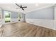 Bright living room with natural light, crown molding, and modern flooring at 3900 Millwood Lane Nw, Lilburn, GA 30047