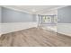 Open living space with hardwood floors and modern trim at 3900 Millwood Lane Nw, Lilburn, GA 30047
