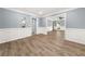 Living room featuring natural lighting and hardwood floors at 3900 Millwood Lane Nw, Lilburn, GA 30047