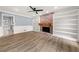 Living room with fireplace and built-in shelves at 3900 Millwood Lane Nw, Lilburn, GA 30047