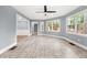 Inviting sunroom featuring large windows and ample natural light at 3900 Millwood Lane Nw, Lilburn, GA 30047