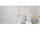 Bright bathroom featuring a tub and vinyl flooring at 5555 Clover Rise Ln, Norcross, GA 30093