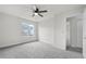 Spacious bedroom featuring neutral paint and plush carpet at 5555 Clover Rise Ln, Norcross, GA 30093