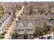 Aerial view of well-maintained townhome community with mature trees and street parking at 1204 Village Se Ct, Atlanta, GA 30316