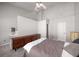 Spacious bedroom with neutral walls, large bed, and vaulted ceilings at 1204 Village Se Ct, Atlanta, GA 30316