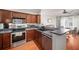 Well-equipped kitchen with modern appliances, sleek countertops, and hardwood floors provides a functional and stylish space at 1204 Village Se Ct, Atlanta, GA 30316