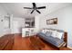 Open-concept living room flowing into the kitchen, featuring hardwood floors and natural light at 1204 Village Se Ct, Atlanta, GA 30316