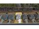 Aerial view of a home showcasing its layout, landscaping, and proximity to neighboring properties at 325 Caledonia Ct, Peachtree City, GA 30269
