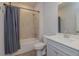 Well-lit bathroom with a tub and shower combination and a neutral color scheme at 325 Caledonia Ct, Peachtree City, GA 30269
