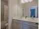 A spacious bathroom featuring double sinks, a mirror and a shower and tub combination at 325 Caledonia Ct, Peachtree City, GA 30269