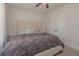 Cozy bedroom with a large bed and ample natural light at 325 Caledonia Ct, Peachtree City, GA 30269