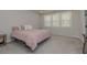 Bright bedroom featuring soft carpet and many windows providing great natural light at 325 Caledonia Ct, Peachtree City, GA 30269