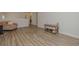 Open floor plan featuring light wood flooring and a cozy seating area at 325 Caledonia Ct, Peachtree City, GA 30269