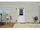 Exterior view of back door with a patio and utility connections at 72 Summer Nw Pl, Cartersville, GA 30121