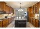 Gourmet kitchen with granite countertops, tile backsplash, stainless appliances and custom wood cabinets at 9369 Kraft Dr, Winston, GA 30187
