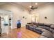 Bright and airy living room with hardwood floors and neutral colored walls that create a warm atmosphere at 9369 Kraft Dr, Winston, GA 30187