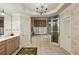 Elegant bathroom featuring a soaking tub, glass shower, and tiled floor at 1059 Hedge Rose Ne Ct, Atlanta, GA 30324