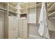 Walk-in closet with custom shelving and ample storage space at 1059 Hedge Rose Ne Ct, Atlanta, GA 30324