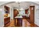 Spacious kitchen with wood cabinetry, granite countertops, and center island at 1059 Hedge Rose Ne Ct, Atlanta, GA 30324