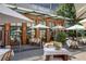 Outdoor patio with table settings and modern building at 1059 Hedge Rose Ne Ct, Atlanta, GA 30324