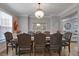 Elegant dining room featuring a large table with decorative chairs and a chandelier at 1554 Sage Ridge Dr, Marietta, GA 30064