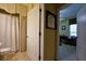 Bright bathroom featuring a toilet next to the shower with a patterned valance at 352 Lauren Ln, Woodstock, GA 30188