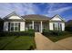 Charming clubhouse featuring classic architecture, well-manicured lawn and inviting entrance at 352 Lauren Ln, Woodstock, GA 30188