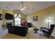 Cozy living room featuring a fireplace, large windows, and comfortable seating at 352 Lauren Ln, Woodstock, GA 30188