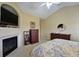 Bright main bedroom featuring a fireplace and an ensuite bath at 352 Lauren Ln, Woodstock, GA 30188