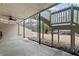 Covered patio with ceiling fan overlooks the backyard with room to entertain and relax at 398 Picketts Xing, Acworth, GA 30101