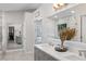 Bright bathroom features a double sink vanity with a large mirror and plenty of counter space at 4037 Mcpherson Dr, Acworth, GA 30101