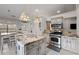 Well-lit kitchen features stainless steel appliances and a granite-topped island at 4037 Mcpherson Dr, Acworth, GA 30101