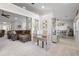 Open living area with brown sofa, neutral tones, and adjacent dining space at 4037 Mcpherson Dr, Acworth, GA 30101