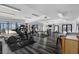 Well-equipped gym featuring modern exercise equipment, sleek flooring, and city views at 115 W Peachtree Nw # 405, Atlanta, GA 30313