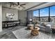 Cozy living room featuring concrete accents, sleek furnishings, and abundant natural light at 115 W Peachtree Nw # 405, Atlanta, GA 30313