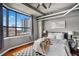 Bedroom featuring exposed ceiling and ducts and large window with neighborhood views at 115 W Peachtree Nw # 405, Atlanta, GA 30313