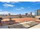 Spacious rooftop terrace with patterned brick, ample seating, and cityscape views at 115 W Peachtree Nw # 405, Atlanta, GA 30313