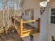 View of a spacious wooden deck featuring railings and a seating area with a satellite dish attached to the house at 3460 Mansions Pkwy, Berkeley Lake, GA 30096