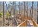 Beautiful, wooden walkway winding through a serene wooded landscape at 3460 Mansions Pkwy, Berkeley Lake, GA 30096