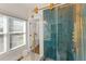 Spa-like shower with unique tile work, modern fixtures, and ample natural light at 633 Mckoy St, Decatur, GA 30030