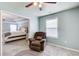 Living room with recliner and view through the doorway to the bedroom at 1832 Millstone Mnr, Conyers, GA 30013