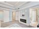 Main bedroom featuring a fireplace, and doorways leading to other rooms at 1832 Millstone Mnr, Conyers, GA 30013