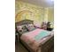 Adorable bedroom with a giraffe mural and a cozy bed with playful bedding at 3954 Riverside Pkwy, Decatur, GA 30034