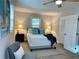 Bedroom with neutral walls, a queen-sized bed, and natural light at 4159 King Valley Se Dr, Smyrna, GA 30082