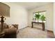 Cozy living room with natural lighting, hardwood floors, and calming decor at 200 Bexley Pkwy, Tyrone, GA 30290