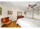 Charming bedroom featuring natural light, hardwood floors, and a view to the ensuite bathroom at 2965 Pharr Court South Nw # 712, Atlanta, GA 30305