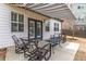 Outdoor patio area with seating, covered by a retractable awning for shade and relaxation at 407 After Glow Smt, Canton, GA 30114